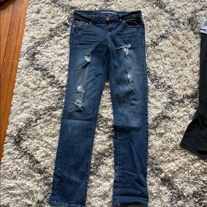 Dark washed jeans with holes